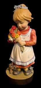 lot 458 image: Original Dolfi Wooden Girl with Animals and Flowers Figurine