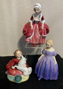 lot 628 image: Royal Doulton Figurines including Home Again, Marie and Goody Two Shoes