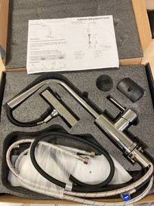 lot 30 image: Never Used Avsiile Pull down Spring loaded Kitchen Faucet