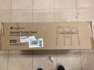 lot 118 image: Brand New in Box Bedside Commode or Raised Toilet Seat with Handles for over the toilet
