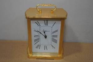 lot 115 image: Vintage Brass Howard Miller Arch Mantel Clock