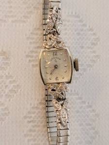 lot 102 image: Lady Elgin 14K White Gold Watch