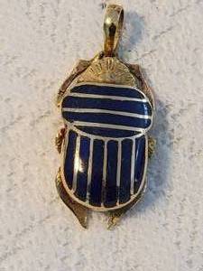 lot 103 image: Heavy 14K Yellow Gold Egyptian Scarab Beetle Pendant with Lapis Inlay  12 grams