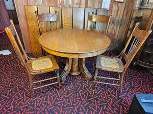 lot 45 image: American Empire Oak Pedestal Dining Table with Married Press-Back, Cane Seated Chairs