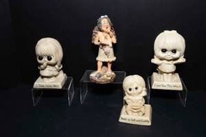 lot 24 image: 1970s Figurines - Set of Four