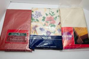 lot 176 image: Three Brand-New Vinyl Tablecloths - 52 x 90