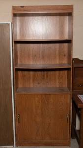 lot 252 image: Laminate Bookshelf with Sliding Door  Wood Look Finish