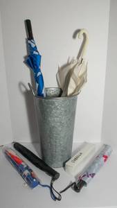 lot 410 image: Umbrella Bucket and Umbrellas