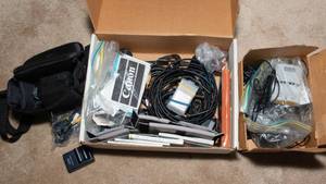 lot 430 image: Miscellaneous Camera andor Video Cords, Battery, and Manuals