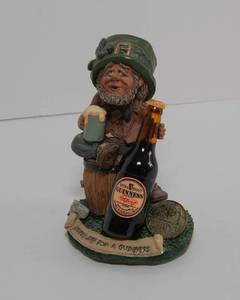 lot 450 image: Lovely Day for a Guinness Figurine