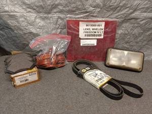 lot 39 image: Assorted Automotive Parts Lot including Brake Pads and Belt