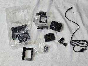 lot 15 image: ActionPro Action Camera with Accessories and Waterproof Case