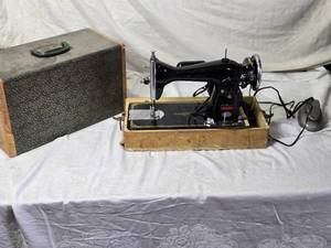 lot 17 image: Vintage Sewing Machine with Portable Case