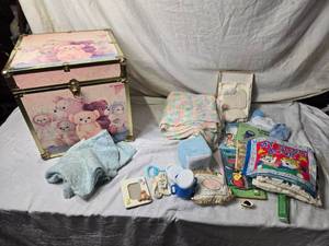 lot 20 image: Baby-Themed Storage Trunk with Collectibles