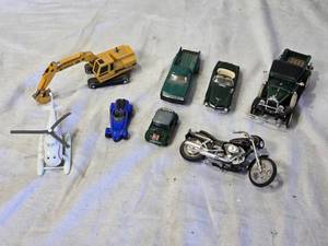 lot 54 image: Die-Cast Model Vehicles Including Cars, Helicopter, and Excavator - Helicopter is an Ertl