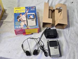 lot 62 image: Casio TV-880 Portable Color LCD Television with Accessories