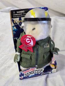 lot 70 image: Dancing Hamster Captain Carl Toy with Pilot Costume