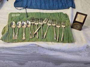 lot 104 image: Antique Rogers Silverware Set and Small Old Clock