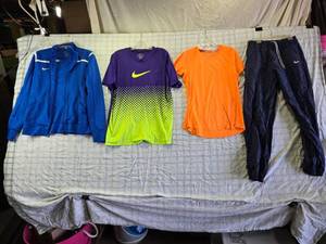 lot 192 image: Nike Athletic Apparel Jacket, 2 Shirts, and Pants - Size L