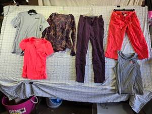 lot 195 image: Nike Clothing Items - Tops, Pants, and Jackets Golf Pants Size 4