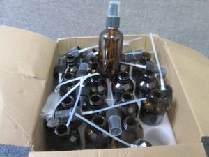 lot 54 image: 16- 4 oz Amber Spritz Bottles...