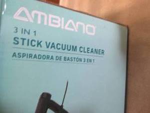 lot 56 image: Stick Vacuum Cleaner powers on...