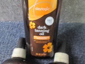 lot 80 image: 6- 8 oz Daylogic Dark Tanning Oil...