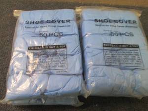 lot 140 image: 4- 50 ct Shoe Covers...