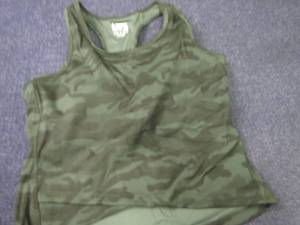 lot 208 image: Ladies Small Running Top...