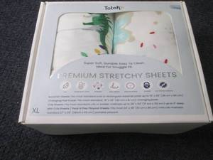 lot 213 image: 2 each XL Christmas Crib Sheets...