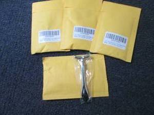 lot 215 image: 4 each Face & Neck Massage Tools...
