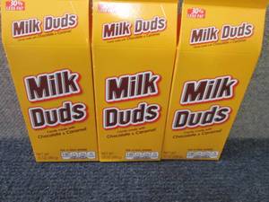 lot 384 image: 3- 10 oz Milk Duds...