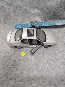 lot 30 image: Sun Scale 118th Scale Steel 2000 Monte Carlo SS Silver
