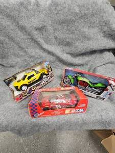 lot 39 image: Misc Boxed Toys, Like New and Earnhardt Palmer Candy Chocolate Car
