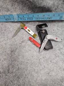 lot 47 image: Duck MFG Assisted OpeningSwiss Army Knife