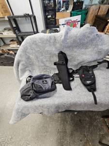lot 63 image: Uncle Mikes 8 38th Holster and Fanny Packs