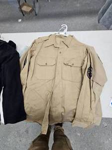 lot 305 image: Military Clothing (3 Shirts,2 ladies Navy Shirts, 3 Navy Shirts,3 Pants, 1 Coat), asst sizes