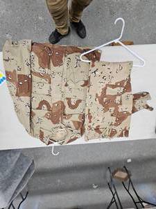lot 306 image: Military Clothing (shirtpant set-Iraq, 1 pair digital pants, 3-GI Coats)