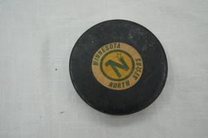 lot 161 image: Minnesota North Stars Vintage NHL Hockey Puck