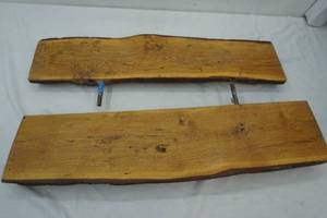 lot 205 image: 2 wood slabs with rebar in it