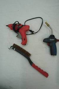 lot 221 image: Stanley Dual Melt glue gun, wire brush, and torch attachment