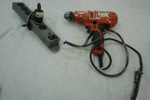 lot 234 image: power drill and power strip