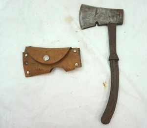 lot 379 image: hatchet and leather cover