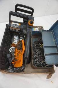 lot 414 image: chainsaw in parts- Electric Worx