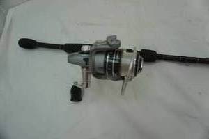 lot 512 image: 1 fishing pole & reel Mitchell