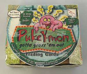 lot 6 image: Vintage Pukey-mon  Factory Sealed Case