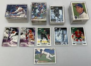 lot 30 image: Misc. Unsorted Baseball Cards In Protective Cases
