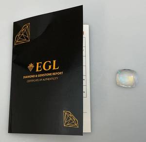 lot 40 image: EGL Cushion Cut 53.30 CT. Bi-Color (LAB CREATED) Mystic Topaz (WITH COA)
