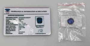 lot 43 image: GIE 9.25Ct. (LAB CREATED) Cushion Cut Blue Sapphire With Card