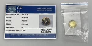 lot 57 image: GGIJ  11.95 Ct. (LAB CREATED) Round Cut Yellow Lemon With Card